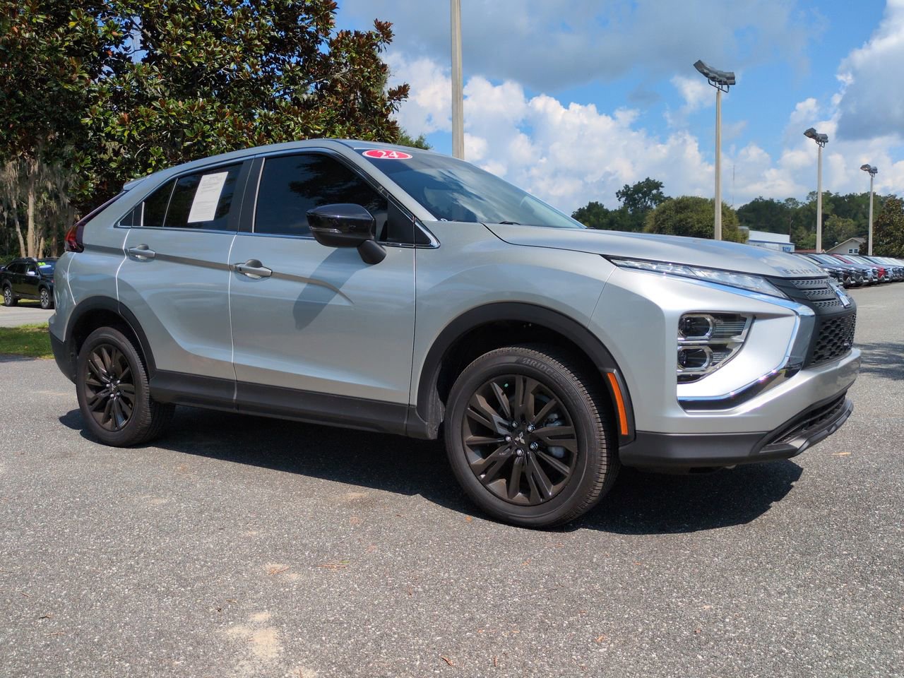 Used 2024 Mitsubishi Eclipse Cross LE with VIN JA4ATVAA5RZ014897 for sale in Ocala, FL