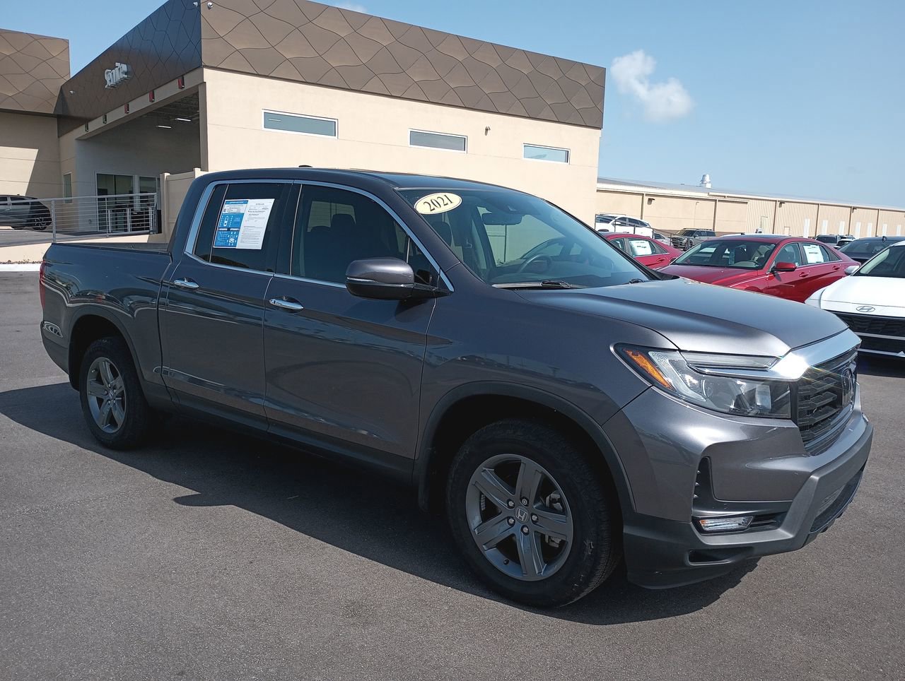 Used 2021 Honda Ridgeline RTL-E with VIN 5FPYK3F71MB018864 for sale in Ocala, FL