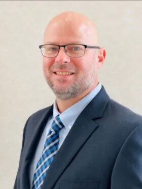 Staff member Will Jordan Jr.  from ID_b86fc4297381