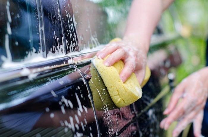 washing a black car