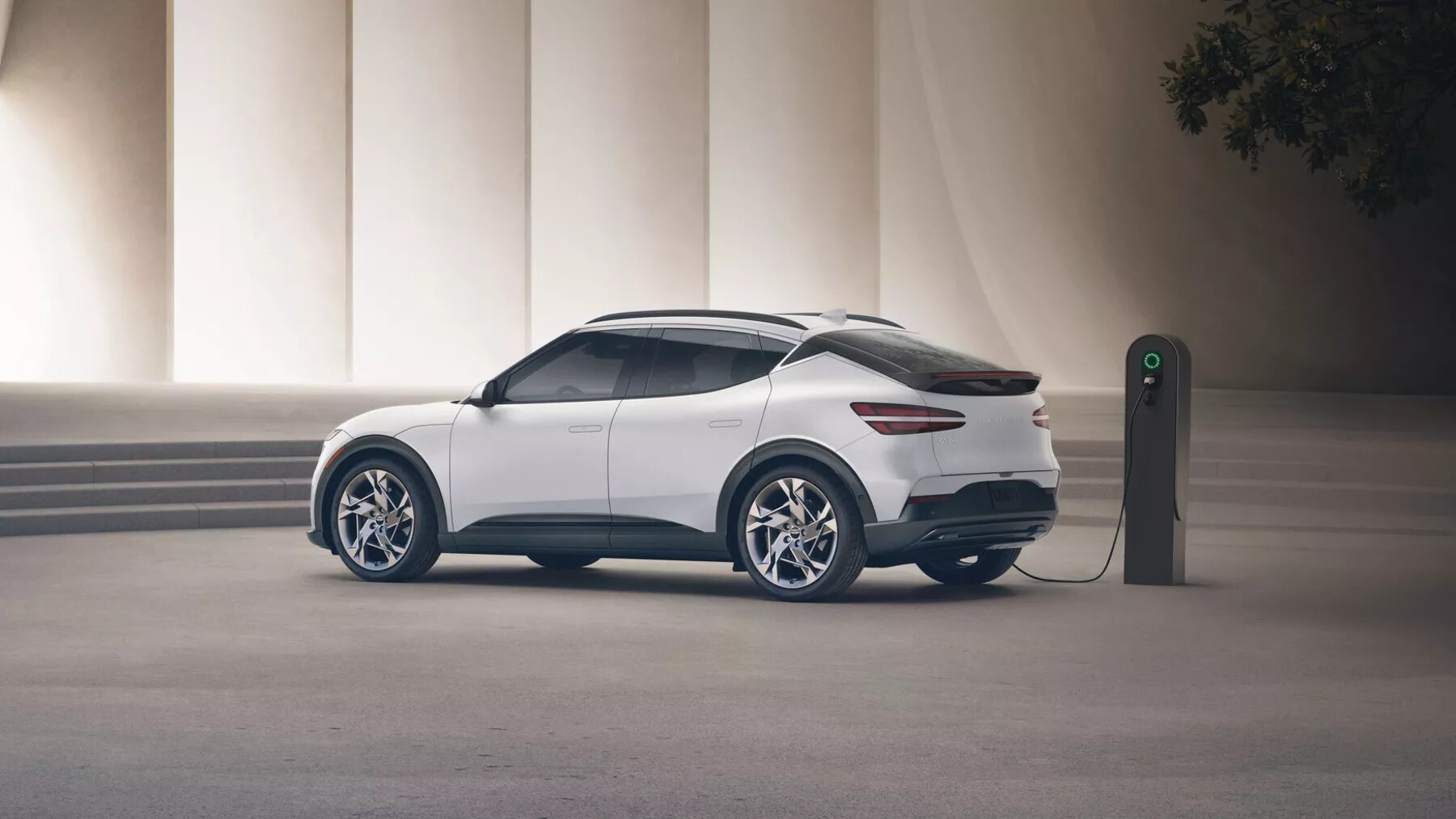 genesis-gv60-ev-suv-electric-plugged-in.png