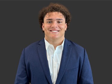 Staff member Jacob Arnold from ID_e414e5d7c95b