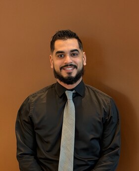 Staff member Caleb Rodriguez from ID_f31d74abfb69