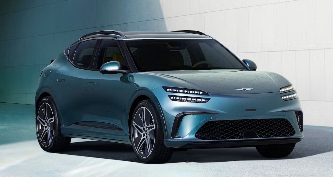  Person cheerfully signing documents.