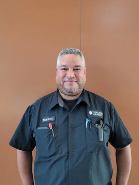 Staff member Marcos Hernandez from 471e92fc7701