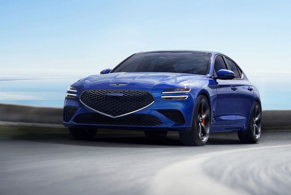 Blue 2026 Genesis G70 cruising