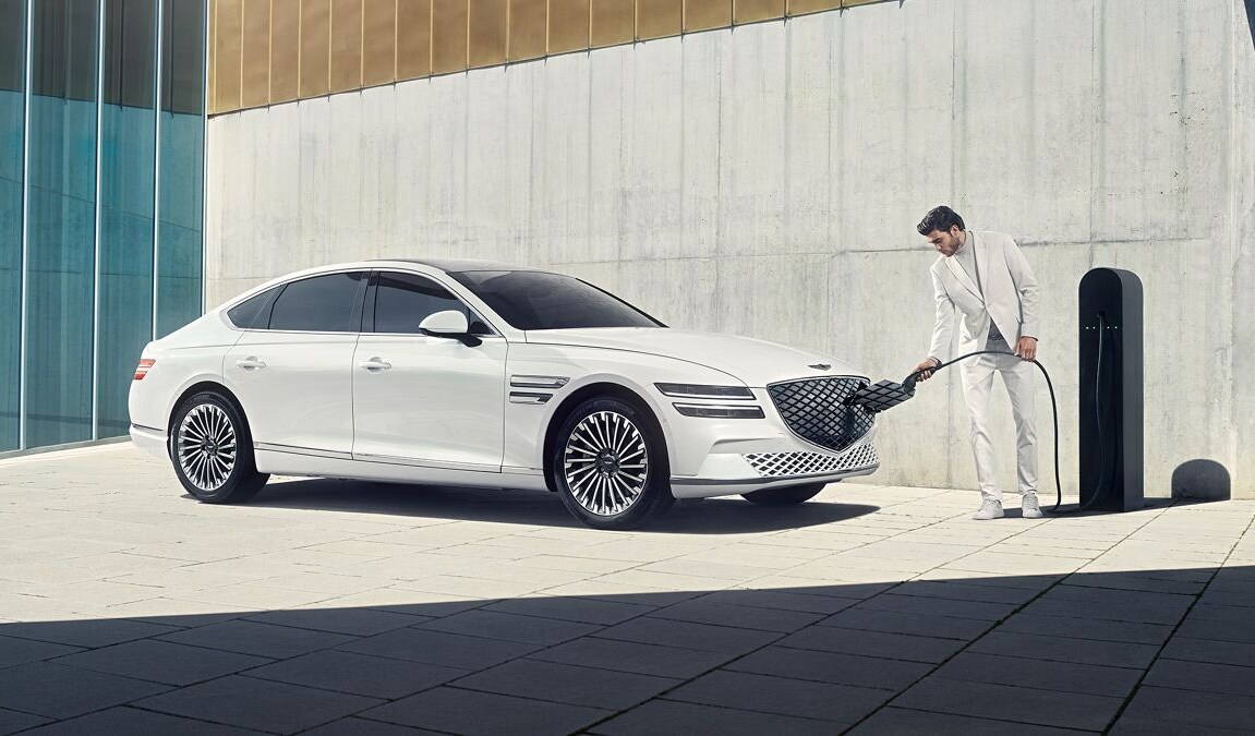 2023-genesis-electrified-G80-plugged-charging-wide.png