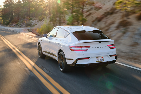 2027 Genesis GV80 Coupe driving on the highway