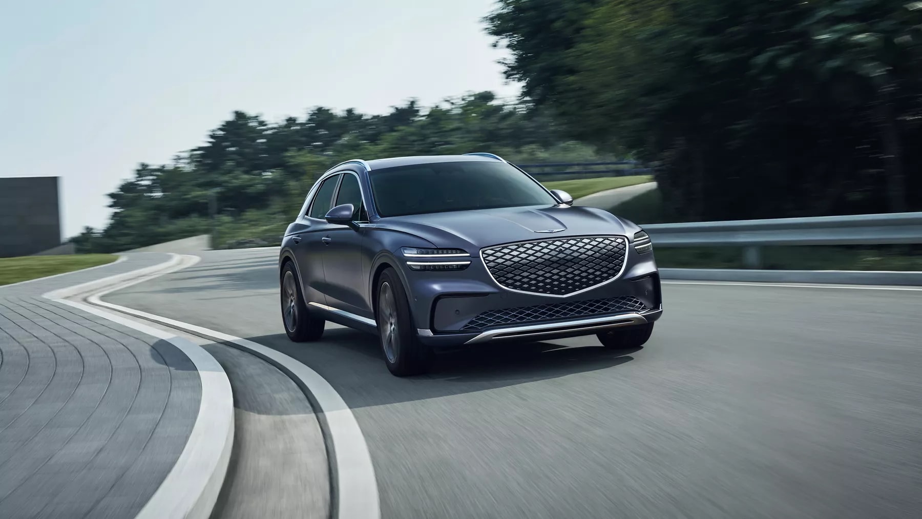 2026 Genesis Electrified GV70 driving on the road