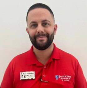 Staff member Robert M from b5b87ca719fe