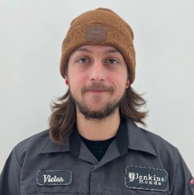 Staff member Victor Munguia from e17df72d560a