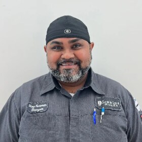 Staff member Shazam Shah from e17df72d560a