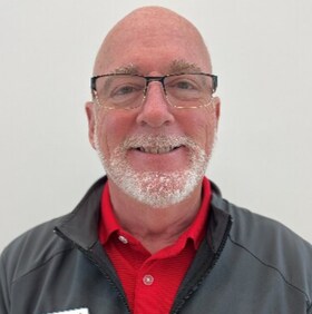 Staff member John Harbaugh from b5b87ca719fe