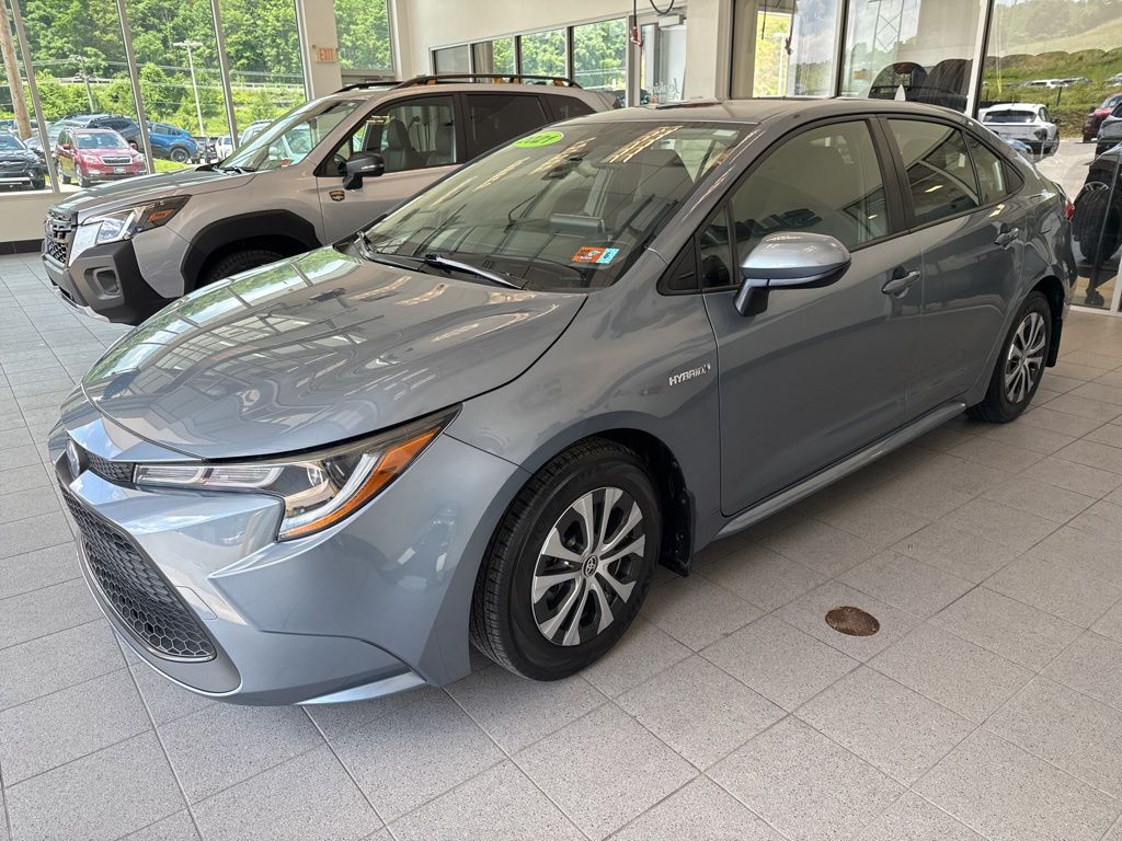 Used 2021 Toyota Corolla LE with VIN JTDEAMDE6MJ028627 for sale in Northfield, Minnesota