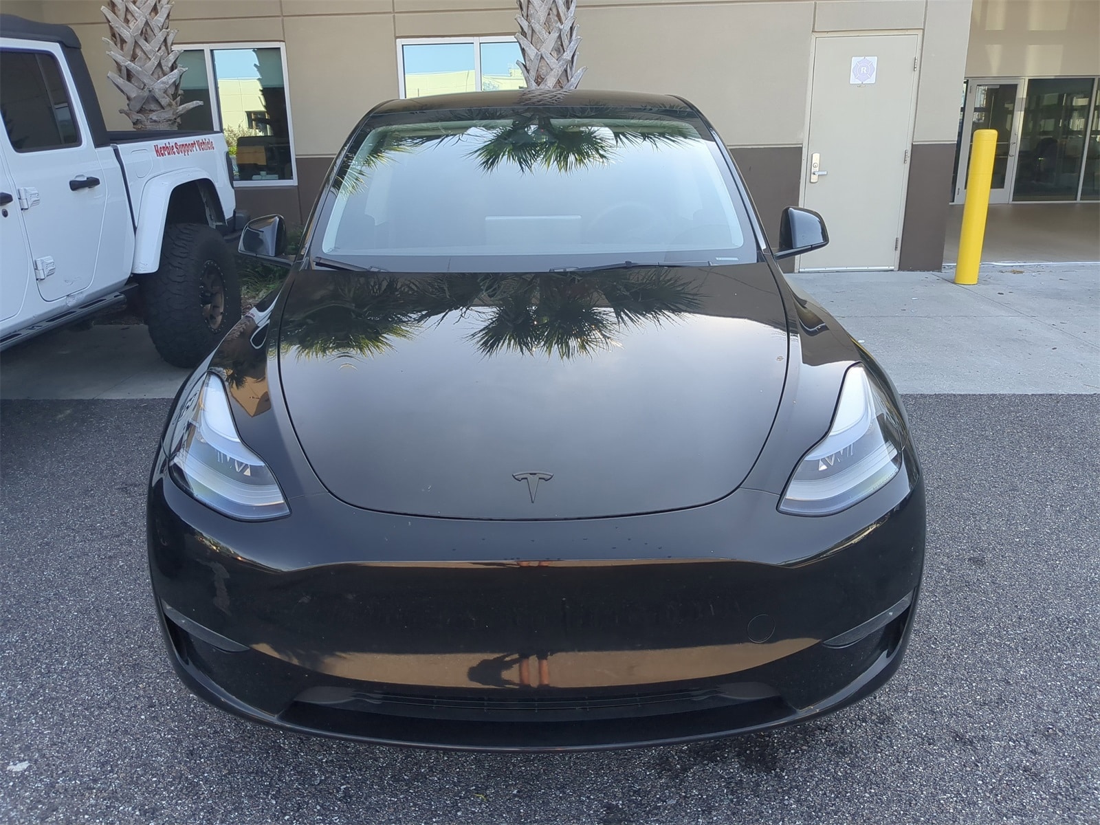 Used 2024 Tesla Model Y Long Range with VIN 7SAYGDEE5RA248348 for sale in Jacksonville, FL