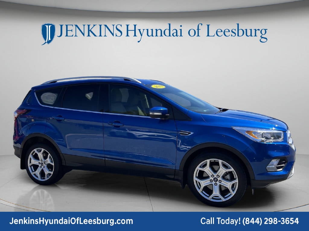 Used 2017 Ford Escape Titanium with VIN 1FMCU0J93HUD40323 for sale in Leesburg, FL