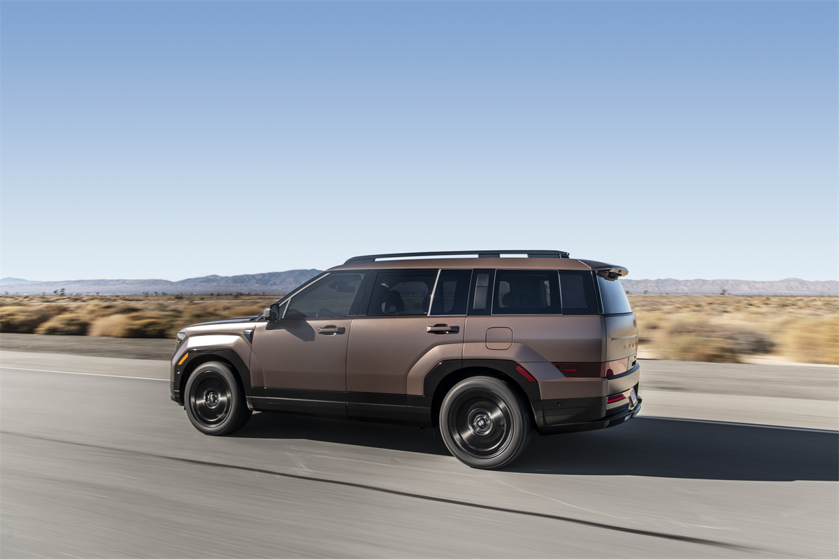 2027 Hyundai Santa Fe driving on the highway