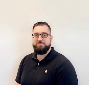 Staff member Charles Huxoll from ID_1384c05336d9