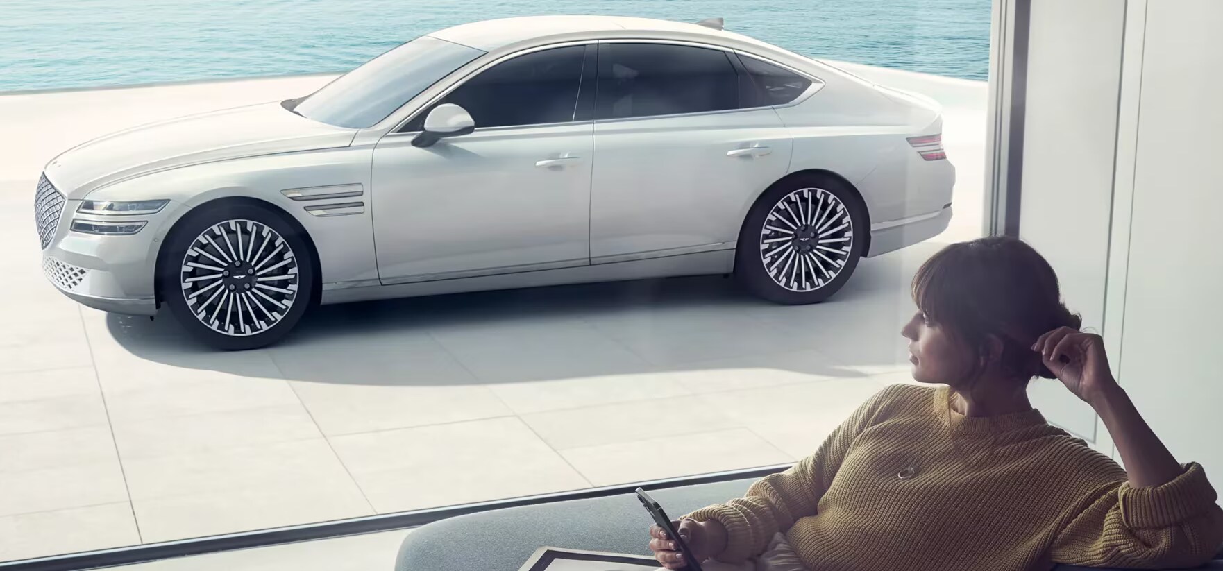 Genesis-generic-woman-car.png