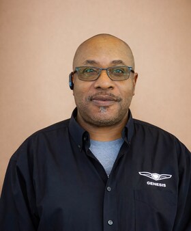 Staff member Solomon Thomas  from ID_97210862b9f3