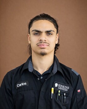 Staff member Carlos Cruz Jr. from ID_97210862b9f3