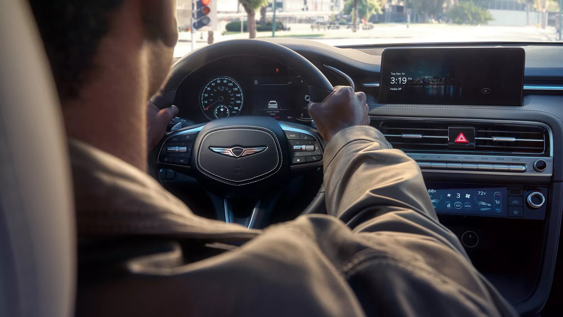driving a 2026 Genesis G70 interior shot