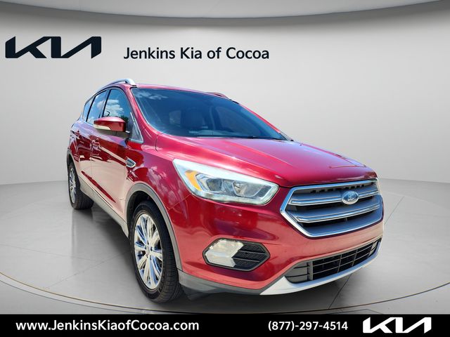Used 2017 Ford Escape Titanium with VIN 1FMCU0JD2HUB57063 for sale in Cocoa, FL
