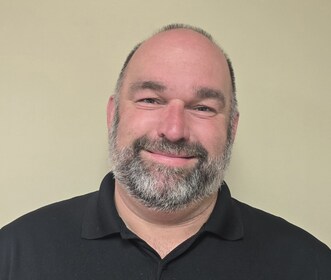 Staff member Aaron Jandro from ID_6576dc84ee2a