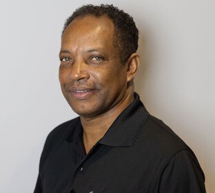 Staff member Hantz Philogene from ID_957f58c78fc4