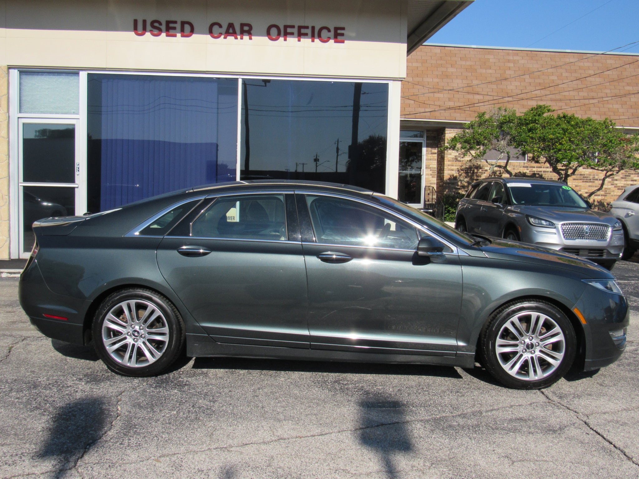 Used 2015 Lincoln MKZ Hybrid with VIN 3LN6L2LU2FR616587 for sale in Lakeland, FL