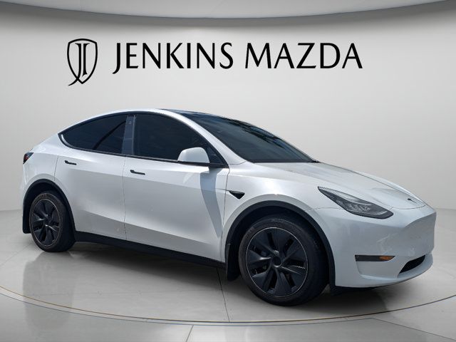 Used 2023 Tesla Model Y Long Range with VIN 7SAYGDEE0PA067008 for sale in Ocala, FL