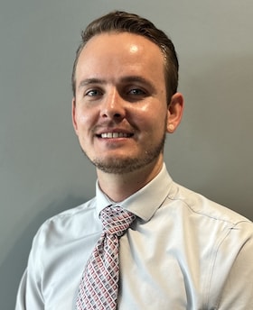 Staff member Riley Watson from a896ac979f4a