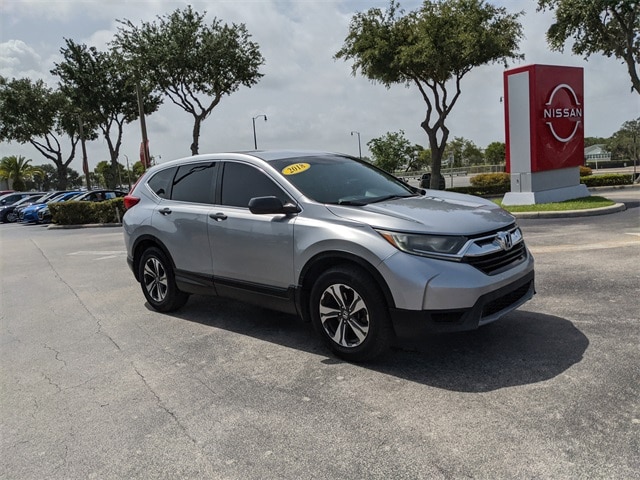 Used 2018 Honda CR-V LX with VIN 5J6RW5H35JL003973 for sale in Leesburg, FL