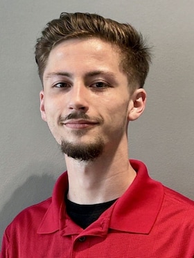 Staff member Aidan Mathis from d15f24dfac58
