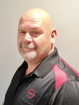 Staff member Larry Bates from 5af31a18d476