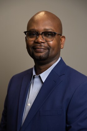 Staff member Eric Nyaga from 7b3856bf643d