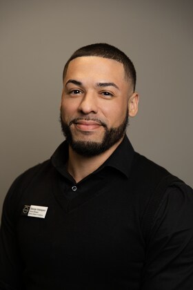 Staff member George Velasquez from 7b3856bf643d