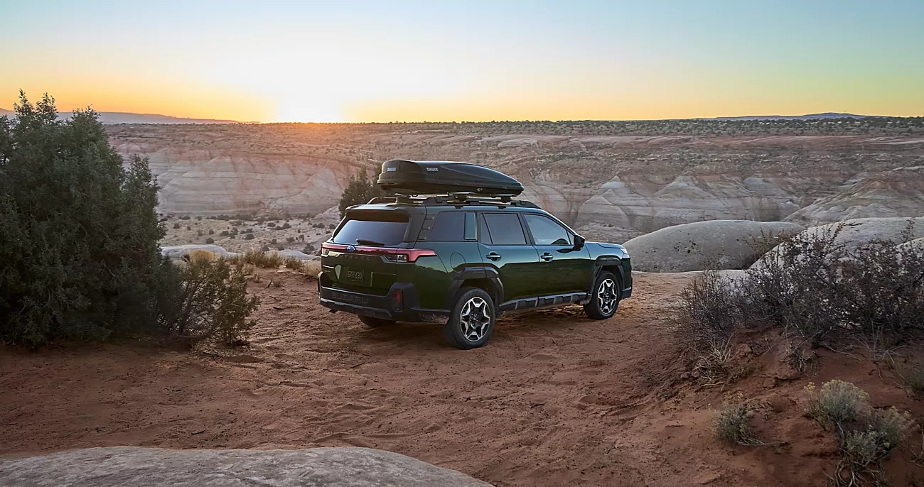 2026 Subaru Outback with canoes overlooking a canyon