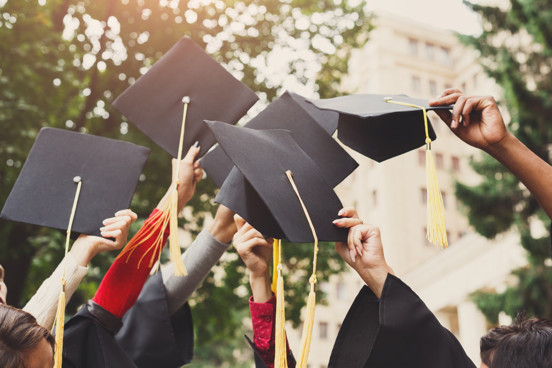 graduates-with-caps.png