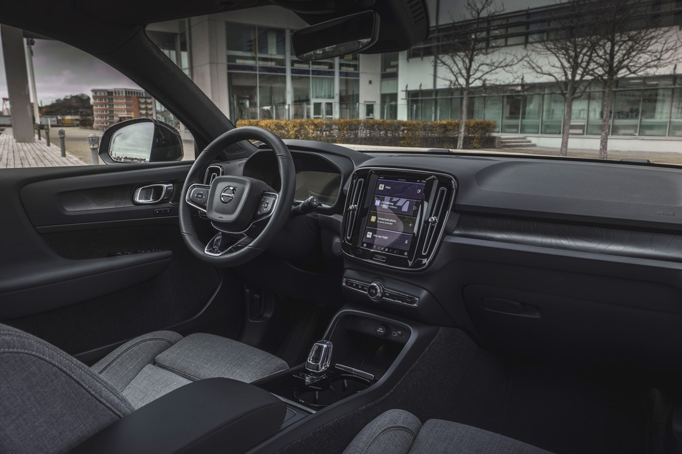 2025-volvo-xc40-front-interior-wide-dash-seating.png