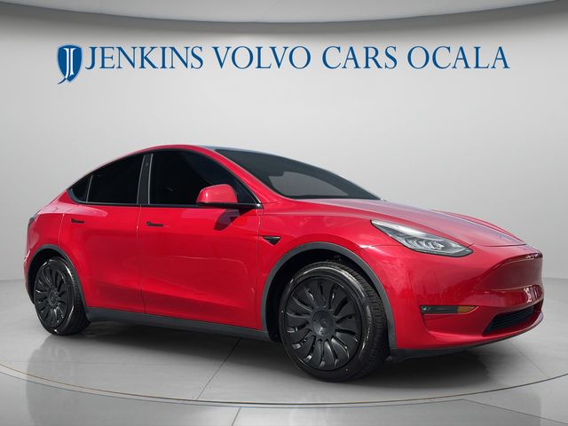 Used 2021 Tesla Model Y Standard Range with VIN 5YJYGDED7MF107264 for sale in Ocala, FL