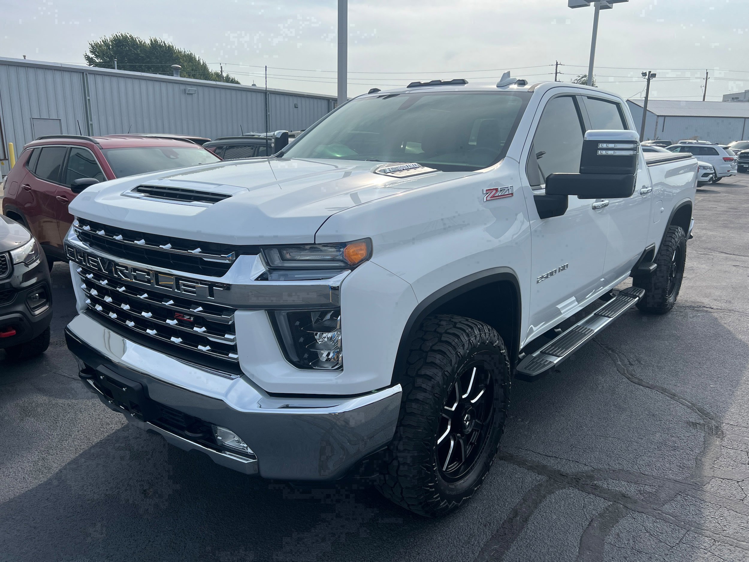 Used 2021 Chevrolet Silverado 2500HD LTZ with VIN 1GC4YPEY5MF284861 for sale in Le Mars, IA