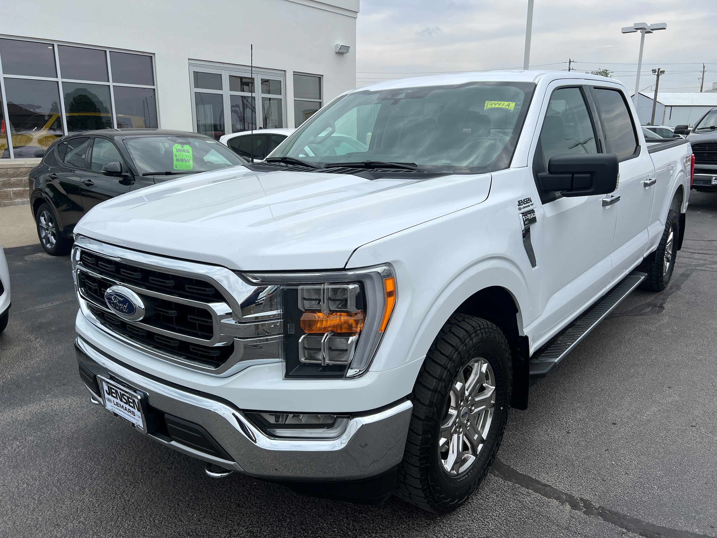 Used 2021 Ford F-150 XLT with VIN 1FTFW1E82MKE11701 for sale in Le Mars, IA