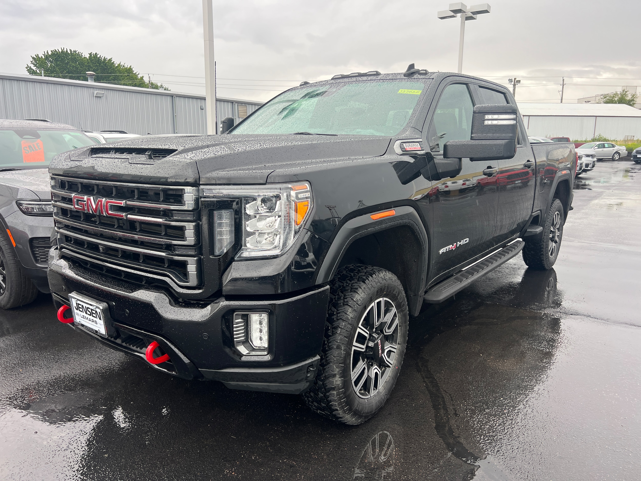 Used 2021 GMC Sierra 2500HD AT4 with VIN 1GT49PEY3MF146023 for sale in Le Mars, IA