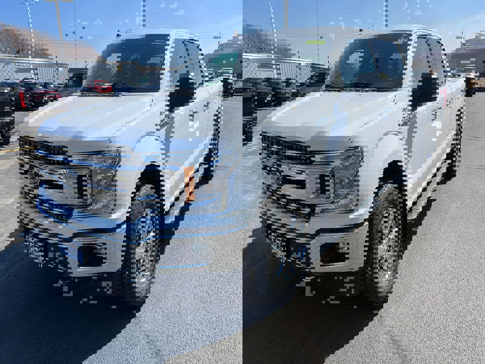 Used 2019 Ford F-150 XLT with VIN 1FTFW1E48KKD26050 for sale in Le Mars, IA