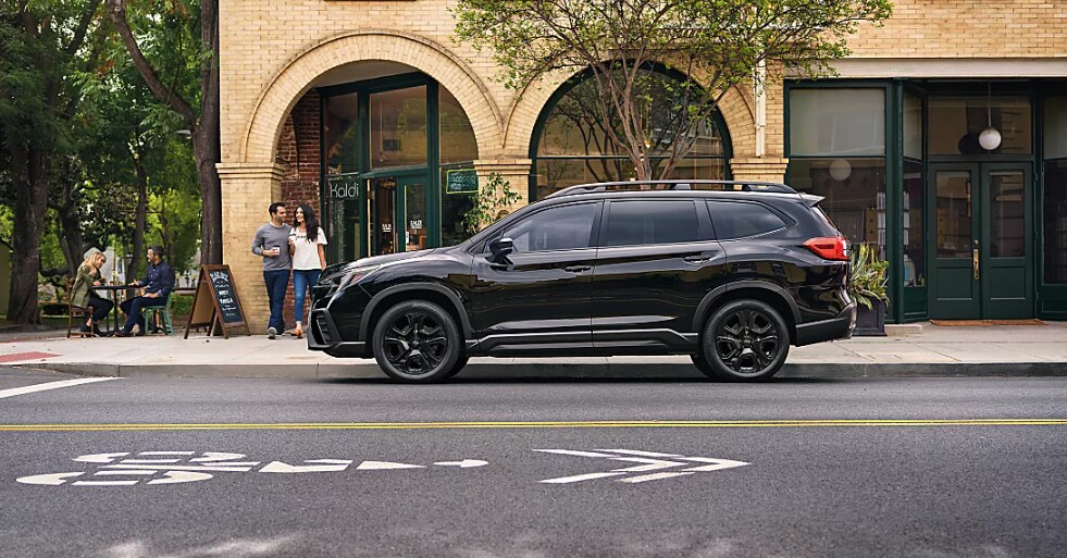 2026 Subaru Ascent SUV in black side profile parked on city street