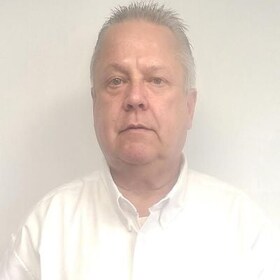 Staff member John Finucane from ID_7d7dd559def2