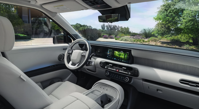 The 2027 Hyundai Palisade Hybrid Driving Near Dallas, TX