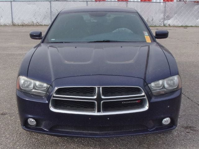 Used 2013 Dodge Charger SXT with VIN 2C3CDXJG4DH571860 for sale in Junction City, KS