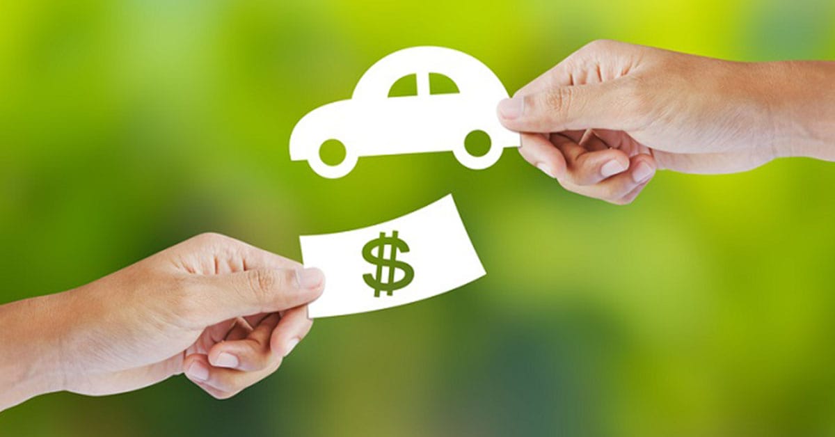 Cash and car exchange as part of a Chevrolet trade-in